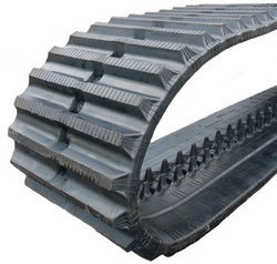 A close-up of a Rubber track to fit Hanix N550-2 (52 lugs) showing the lugs. - Viqan Replacement Tracks & Undercarriage Parts for Heavy Equipment