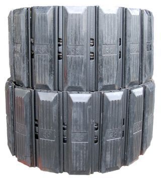 A stack of black rubber blocks on a white background, typically used with Steel tracks w/ rubber pads for a Hitachi EX60-1. - Viqan Replacement Tracks & Undercarriage Parts for Heavy Equipment A stack of black rubber blocks on a white background, typically used with Steel tracks w/ rubber pads for a Hitachi EX60-1. - Viqan Replacement Tracks & Undercarriage Parts for Heavy Equipment