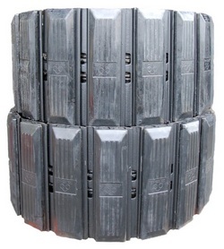 A stack of Steel tracks with rubber pads for John Deere 60D sits on a white background. - Viqan Replacement Tracks & Undercarriage Parts for Heavy Equipment A stack of Steel tracks with rubber pads for John Deere 60D sits on a white background. - Viqan Replacement Tracks & Undercarriage Parts for Heavy Equipment
